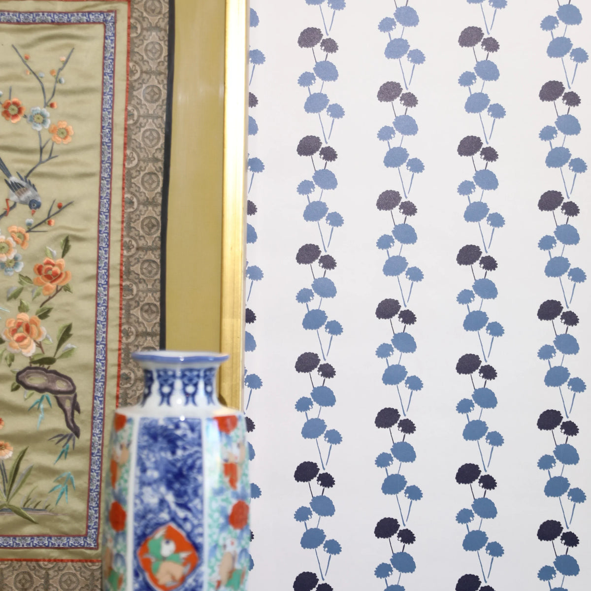 Luxury botanical and floral wallpaper featuring an elegant linear dahlia vine pattern inspired by English gardens, designed for modern traditional interiors, powder rooms, bedrooms, dining spaces, and layered luxury homes. Sustainably printed in England by Truett Designs.