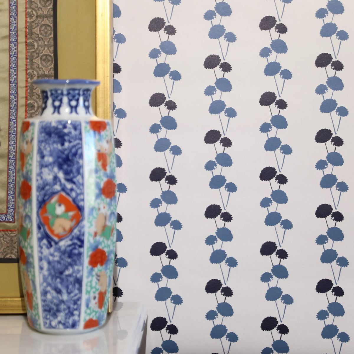 Luxury botanical and floral wallpaper featuring an elegant linear dahlia vine pattern inspired by English gardens, designed for modern traditional interiors, powder rooms, bedrooms, dining spaces, and layered luxury homes. Sustainably printed in England by Truett Designs.
