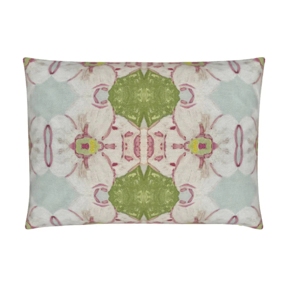 Pink Dogwoods luxury pillow featuring a large-scale abstract floral pattern in pink, soft blue, and grass green tones, handcrafted in England for layered designer interiors and luxury homes.
