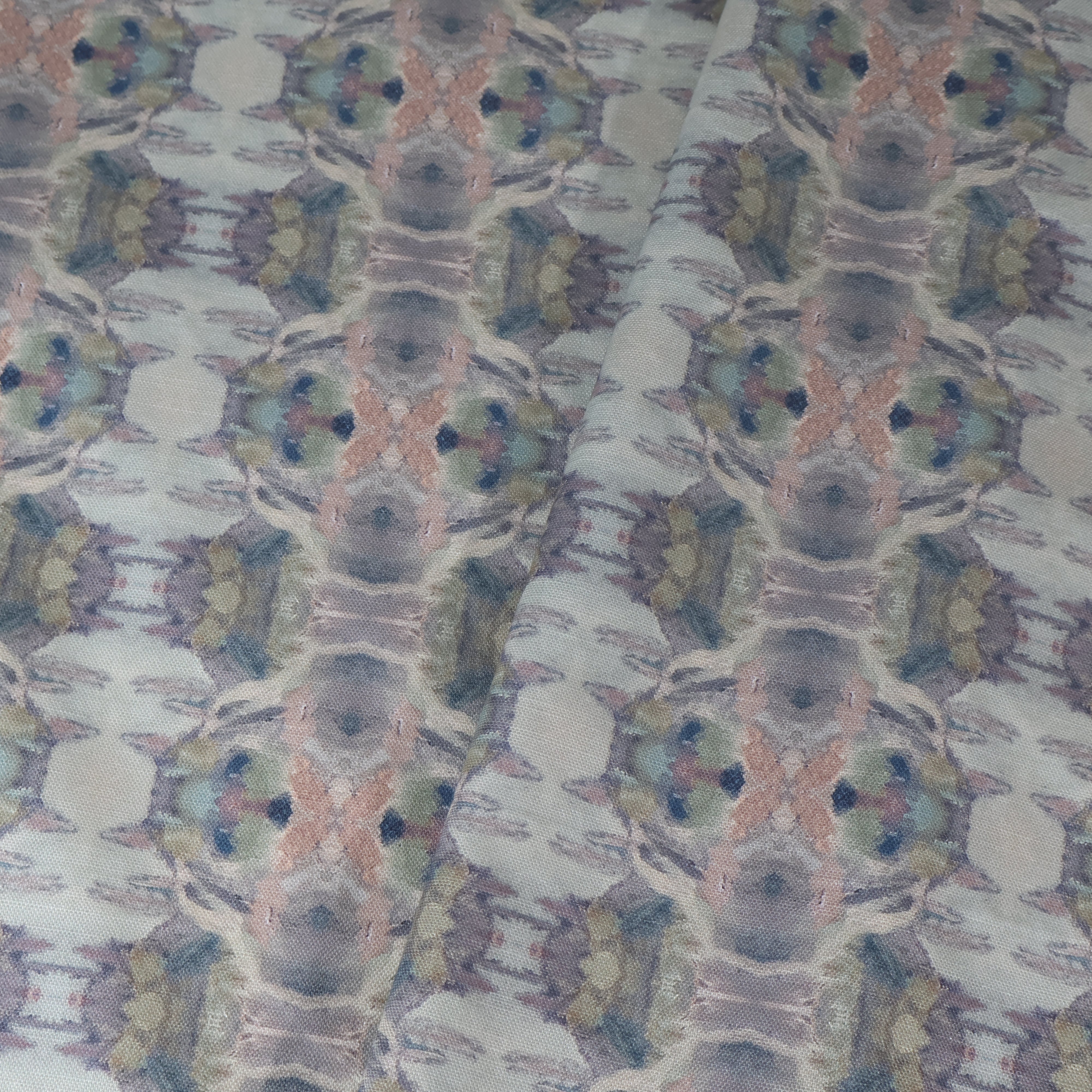 Luxury abstract fabric featuring flowing landscape-inspired movement in warm dusty neutral tones with hidden fox details for collected modern traditional interiors.