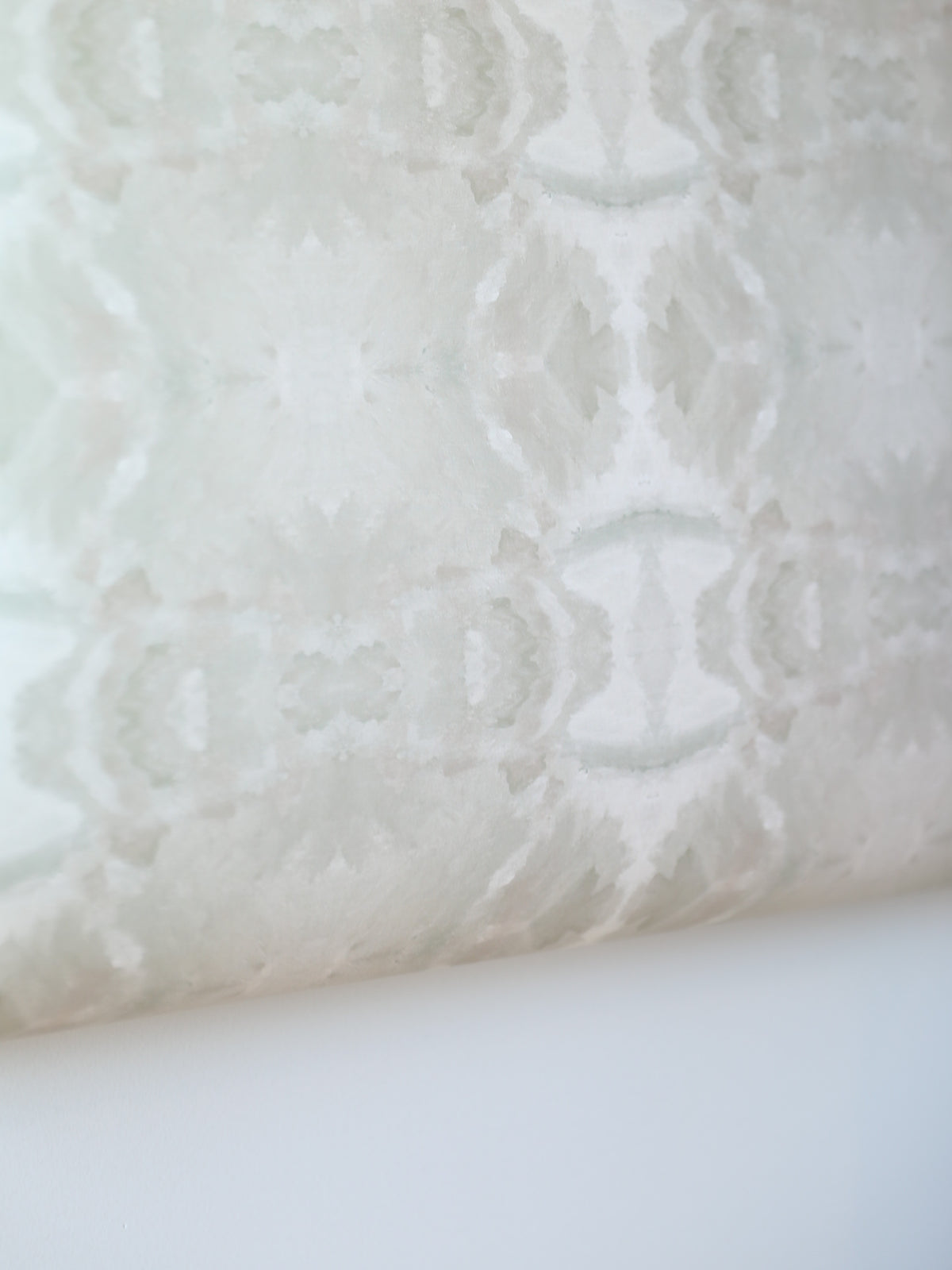 luxury abstract neutral wallpaper in soft putty tones with layered organic movement inspired by live oak trees, designed for modern traditional interiors, luxury bedrooms, powder rooms, dining spaces, and collected contemporary homes. Sustainably printed in England by Truett Designs.