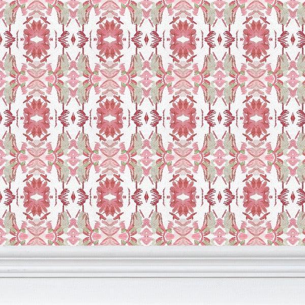 Luxury floral wallpaper featuring an artistic wildflower pattern in strawberry pink, blush, and soft green tones, designed for modern traditional interiors, bedrooms, powder rooms, and collected homes.