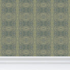 Luxury abstract wallpaper in rich rosemary green tones with layered organic movement and artistic detail, designed for modern traditional interiors, luxury bedrooms, powder rooms, dining spaces, and collected contemporary homes. Sustainably printed in England by Truett Designs.