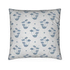Luxury decorative pillow featuring flowing ginkgo leaf patterns in colonial blue and soft neutral tones, styled for a layered modern traditional interior.