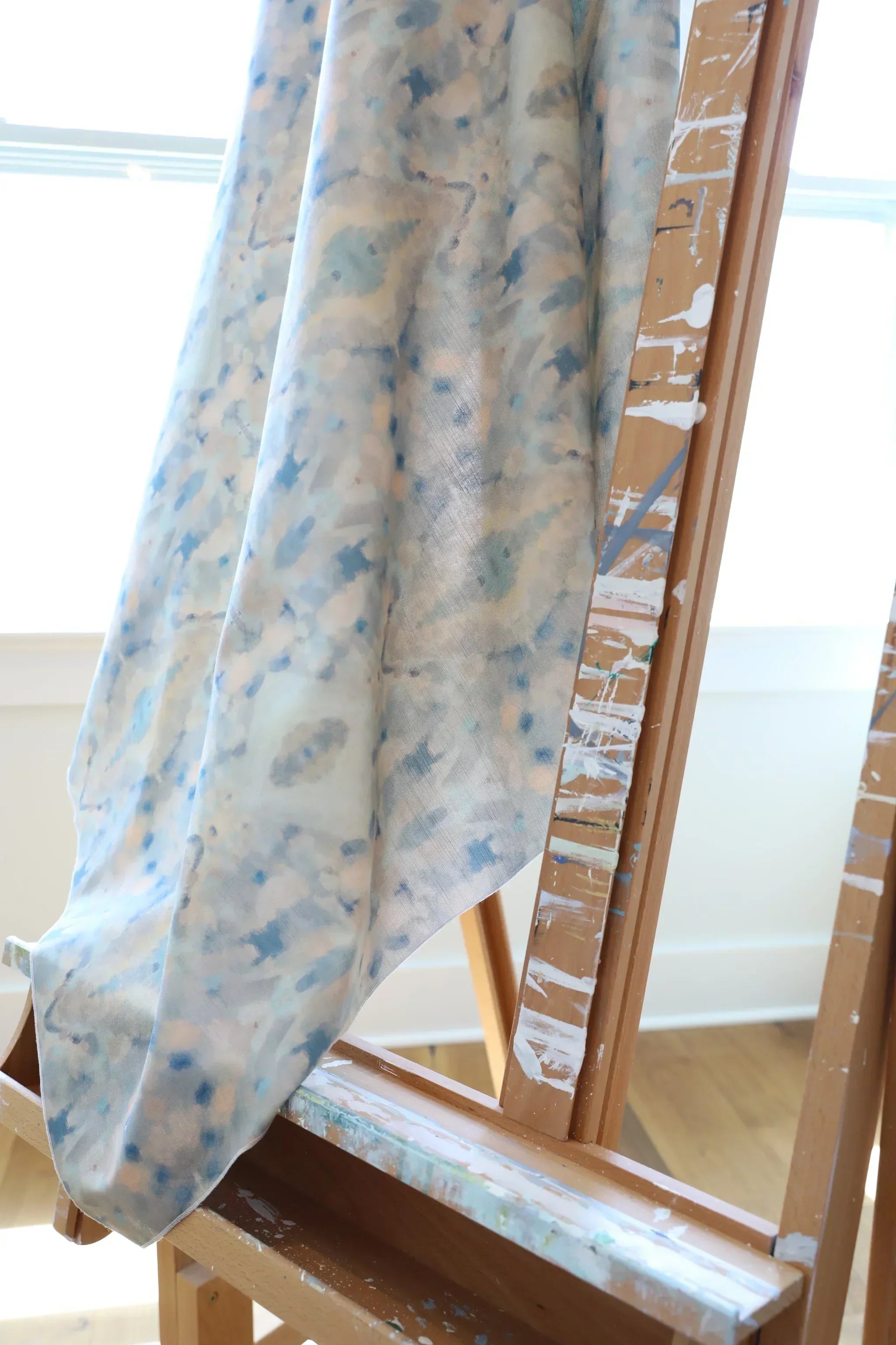 Luxury abstract fabric with layered organic movement inspired by Colorado River rock, designed for drapery, upholstery, bedding, and modern traditional interiors. Large-scale pattern with soft tonal variation and natural texture for collected luxury homes. Sustainably printed and handcrafted in England by Truett Designs.