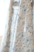 Luxury abstract fabric with layered organic movement inspired by Colorado River rock, designed for drapery, upholstery, bedding, and modern traditional interiors. Large-scale pattern with soft tonal variation and natural texture for collected luxury homes. Sustainably printed and handcrafted in England by Truett Designs.