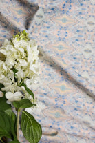 Luxury abstract fabric with layered organic movement inspired by Colorado River rock, designed for upholstery, drapery, bedding, and modern traditional interiors. Small-scale repeat with soft tonal variation and natural texture for collected luxury homes. Sustainably printed and handcrafted in England by Truett