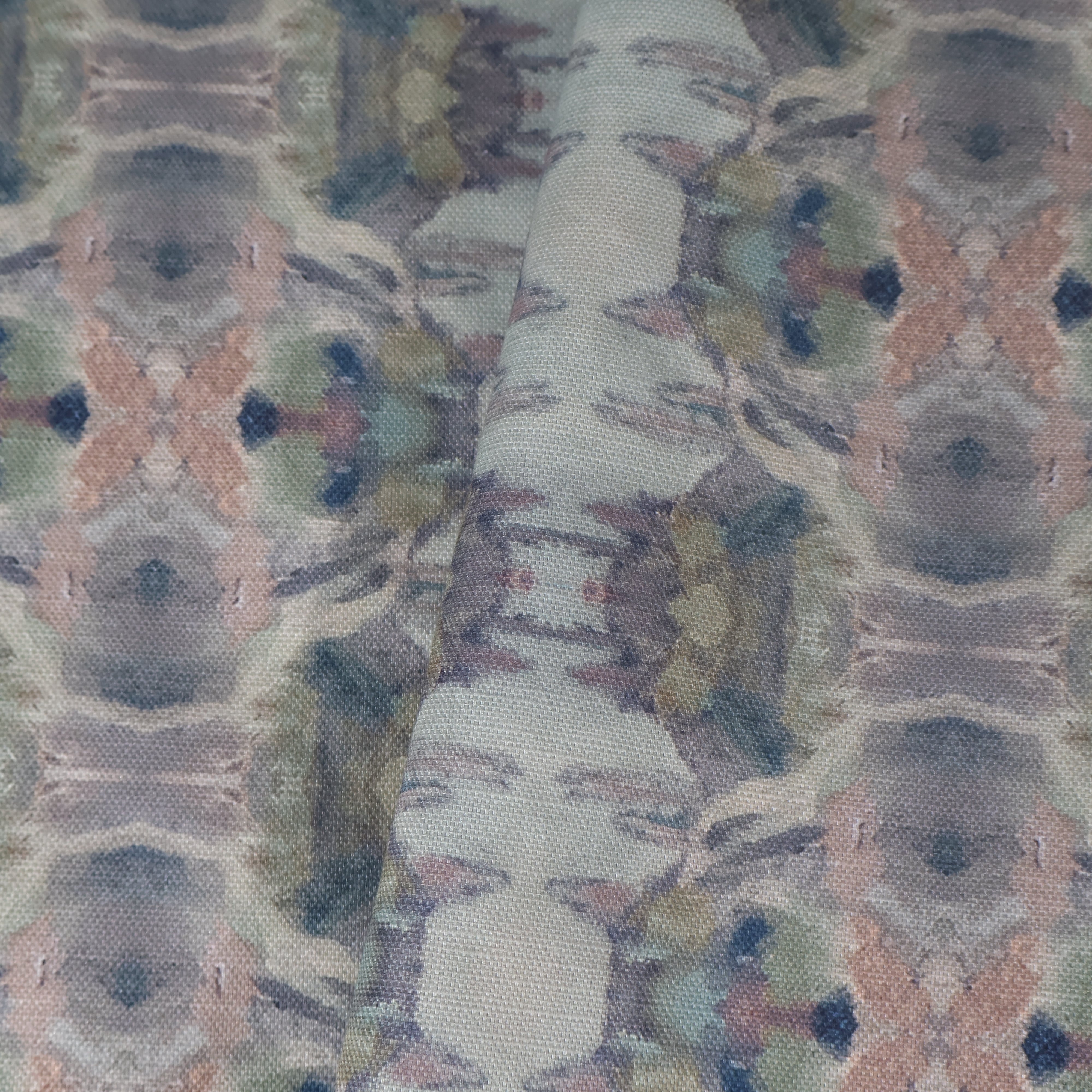 Luxury abstract fabric featuring flowing landscape-inspired movement in warm dusty neutral tones with hidden fox details for collected modern traditional interiors.
