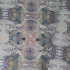 Luxury abstract fabric featuring flowing landscape-inspired movement in warm dusty neutral tones with hidden fox details for collected modern traditional interiors.