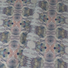 Luxury abstract fabric featuring flowing landscape-inspired movement in warm dusty neutral tones with hidden fox details for collected modern traditional interiors.