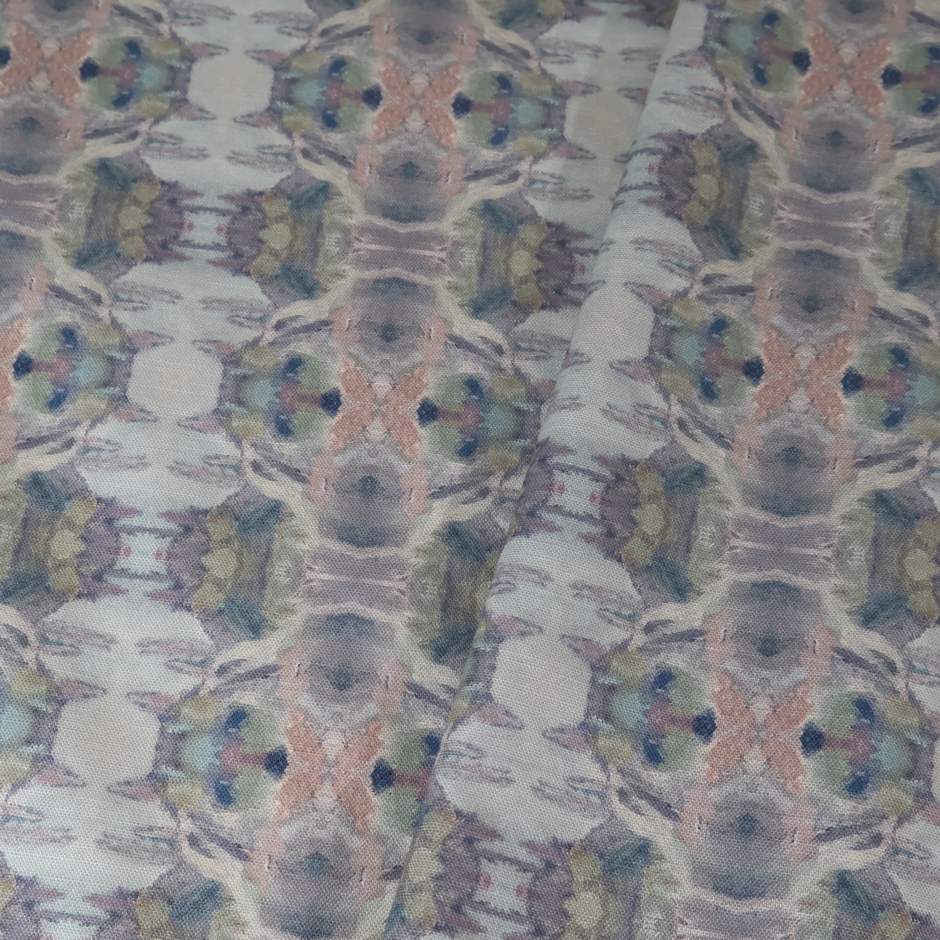 Luxury abstract fabric featuring flowing landscape-inspired movement in warm dusty neutral tones with hidden fox details for collected modern traditional interiors.