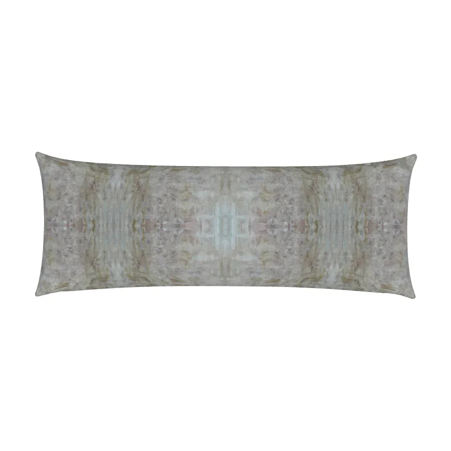 Luxury bolster pillow featuring an abstract garden-inspired pattern in layered bronze, iris blue, and earthy tones, styled for a collected modern traditional interior.