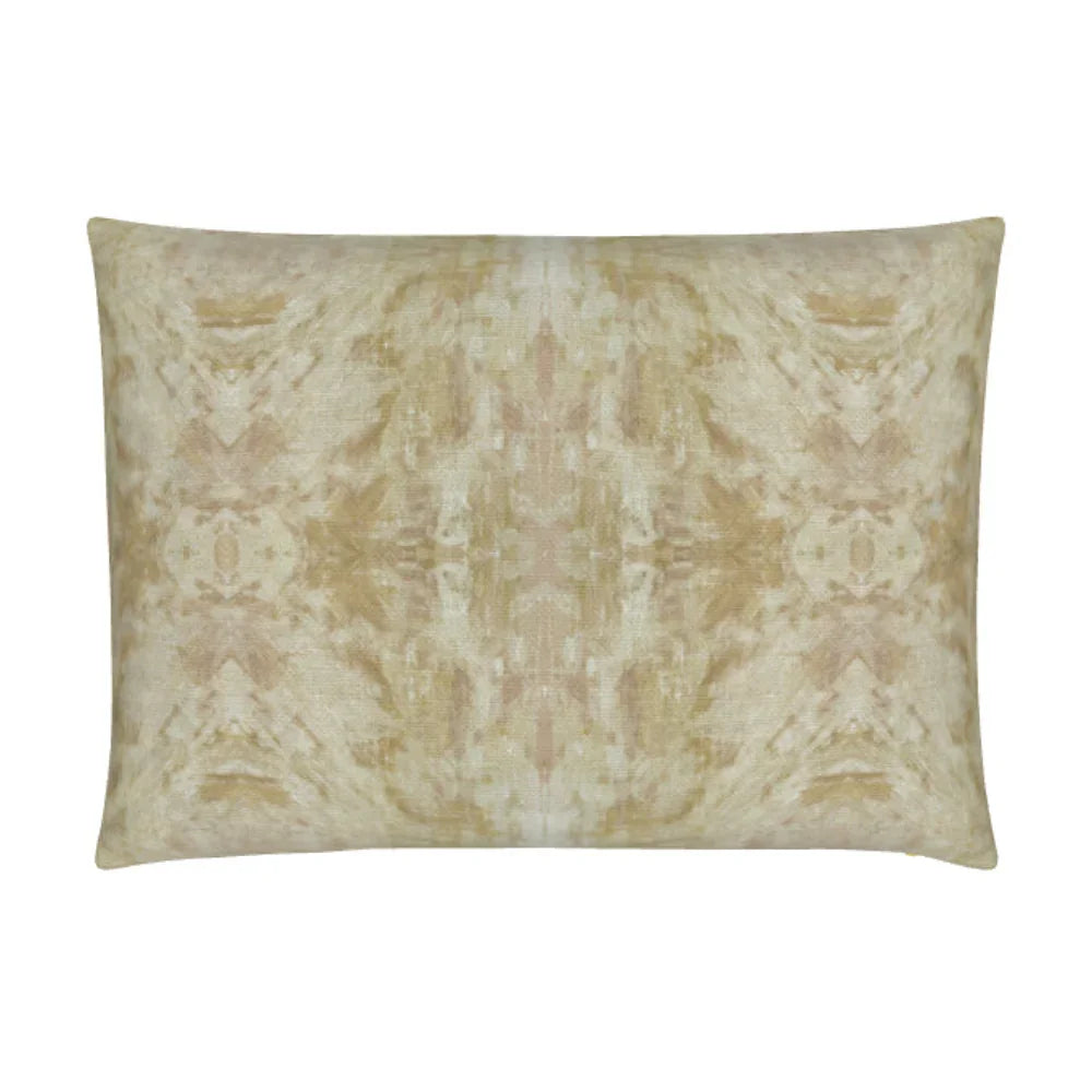 Luxury decorative pillow featuring an abstract topiary-inspired pattern in warm autumn gold and neutral tones, styled for a layered modern traditional interior.