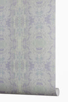 Designer abstract wallpaper with a richly layered pattern in lavender, soft blue, and sage green, inspired by Truett's original artwork and ideal for sophisticated modern traditional interiors.