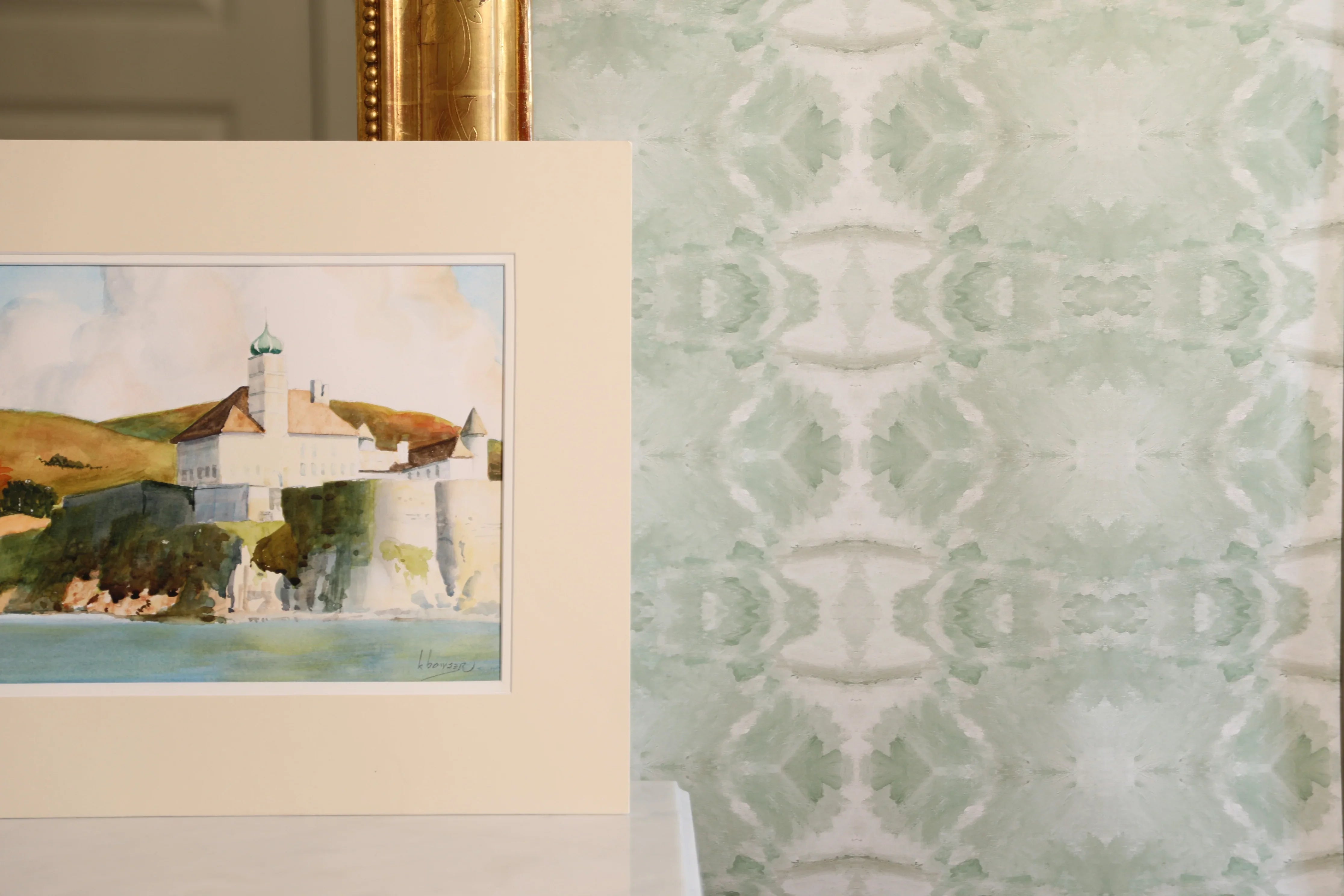 Luxury abstract jade green wallpaper with layered organic movement inspired by live oak trees, ideal for modern traditional interiors, luxury bedrooms, powder rooms, dining spaces, and collected contemporary homes. Sustainably printed in England by Truett Designs.