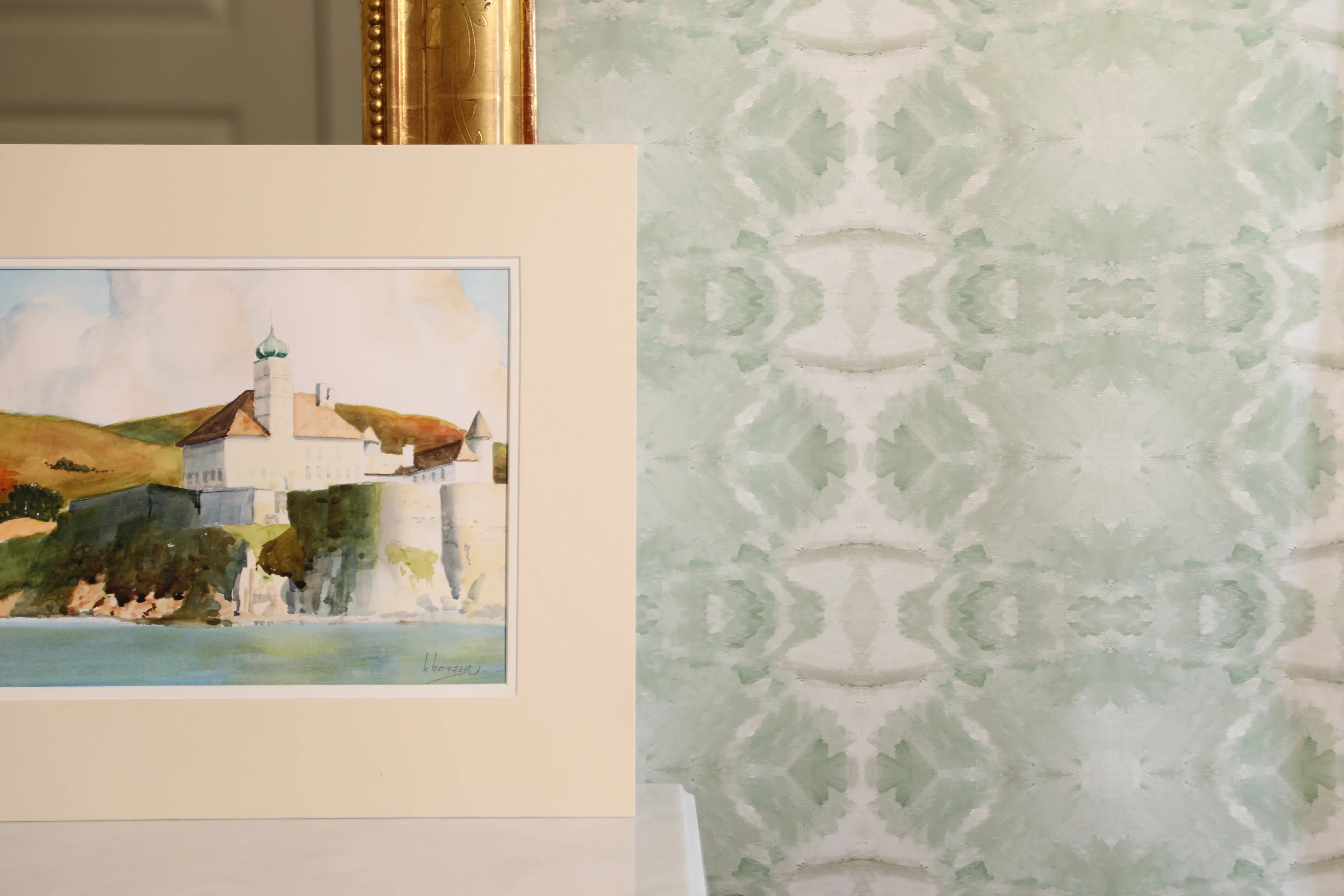 Luxury abstract jade green wallpaper with layered organic movement inspired by live oak trees, ideal for modern traditional interiors, luxury bedrooms, powder rooms, dining spaces, and collected contemporary homes. Sustainably printed in England by Truett Designs.