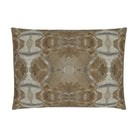Luxury decorative pillow featuring an organic tree-inspired pattern in warm cognac and neutral tones, styled for a layered modern traditional interior.