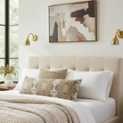 Luxury cognac brown abstract bolster pillow with painterly organic design, handcrafted in England for contemporary and modern traditional interiors.