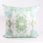 Luxury sage green and blue botanical pillow with large-scale floral pattern inspired by Alaska wildflowers, handcrafted in England and styled for contemporary and traditional interiors.