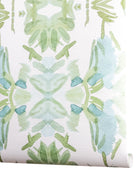 Luxury botanical wallpaper featuring an artistic wildflower-inspired pattern in sage green and soft blue, designed for modern traditional interiors, powder rooms, bedrooms, dining rooms, and collected homes.