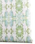 Luxury botanical wallpaper featuring an artistic wildflower-inspired pattern in sage green and soft blue, designed for modern traditional interiors, powder rooms, bedrooms, dining rooms, and collected homes.