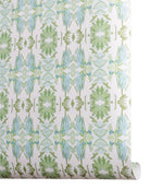 Luxury botanical wallpaper featuring an artistic wildflower-inspired pattern in sage green and soft blue, designed for modern traditional interiors, powder rooms, bedrooms, dining rooms, and collected homes.