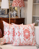 Wildflowers I Strawberry luxury decorative pillow featuring a large-scale abstract floral pattern in rich strawberry pink and red tones, handcrafted in England for luxury living rooms, designer-curated interiors, layered bedrooms, and modern traditional homes.