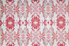 Luxury floral wallpaper featuring an artistic wildflower pattern in strawberry pink, blush, and soft green tones, designed for modern traditional interiors, bedrooms, powder rooms, and collected homes.
