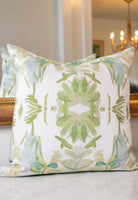 Luxury white and apple green botanical pillow with large-scale floral pattern inspired by Alaska wildflowers, handcrafted in England for contemporary and traditional interiors.