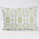 Wildflowers I White & Apple Green luxury pillow featuring an artistic floral pattern on a soft white ground, handcrafted in England for traditional, modern traditional, and layered interior design projects.