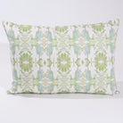 Wildflowers I White & Apple Green luxury pillow featuring an artistic floral pattern on a soft white ground, handcrafted in England for traditional, modern traditional, and layered interior design projects.