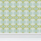 Designer abstract wallpaper in chartreuse green and soft blue with an organic geometric motif, ideal for modern traditional interiors, statement walls, and layered homes.