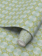 Designer abstract wallpaper in chartreuse green and soft blue with an organic geometric motif, ideal for modern traditional interiors, statement walls, and layered homes.